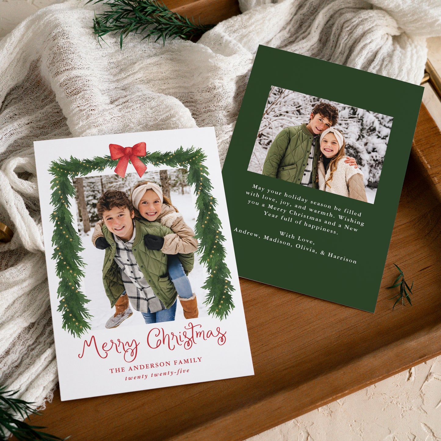 Whimsical Red Bow Garland Christmas 2 Photo Holiday Card | Corjl Template